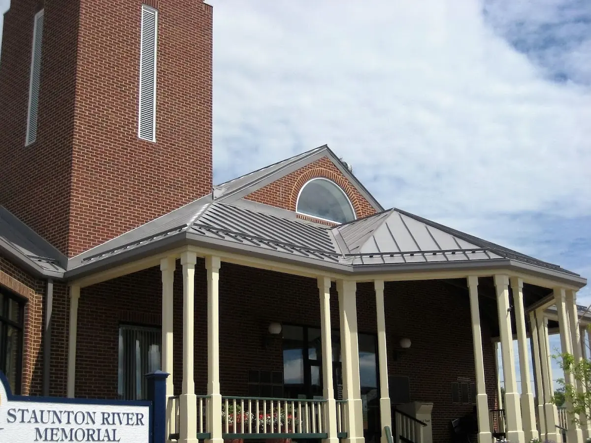 Skilled roofing craftsmen working on a residential roof in Bridgewater Town
